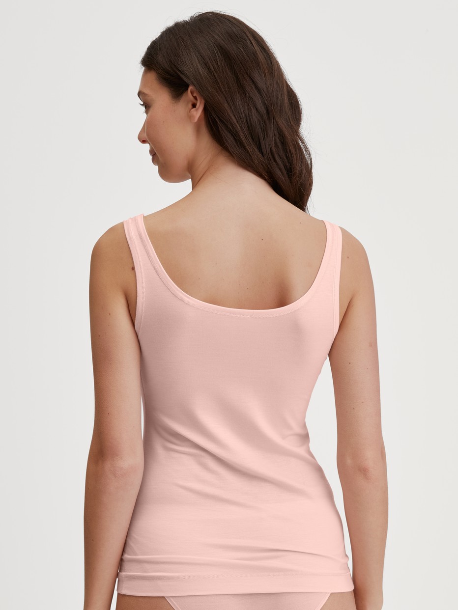 Women model is wearing Tank top made of Modal in Pink, Unicoloured from the Soft Favourites series by CALIDA, Back view