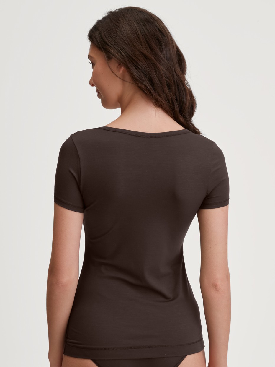 Women model is wearing Shirt short sleeve made of Modal in Brown, Unicoloured from the Soft Favourites series by CALIDA, Back view