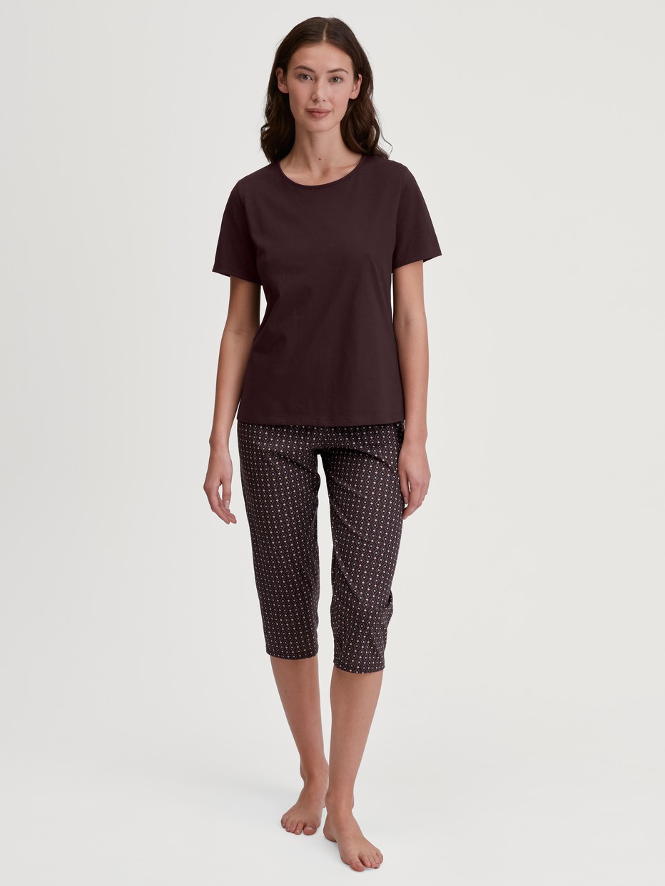 Women model is wearing Shirt short sleeve made of 100% Cotton in Red, Unicoloured from the Favourites Botanic series by CALIDA, Outfit