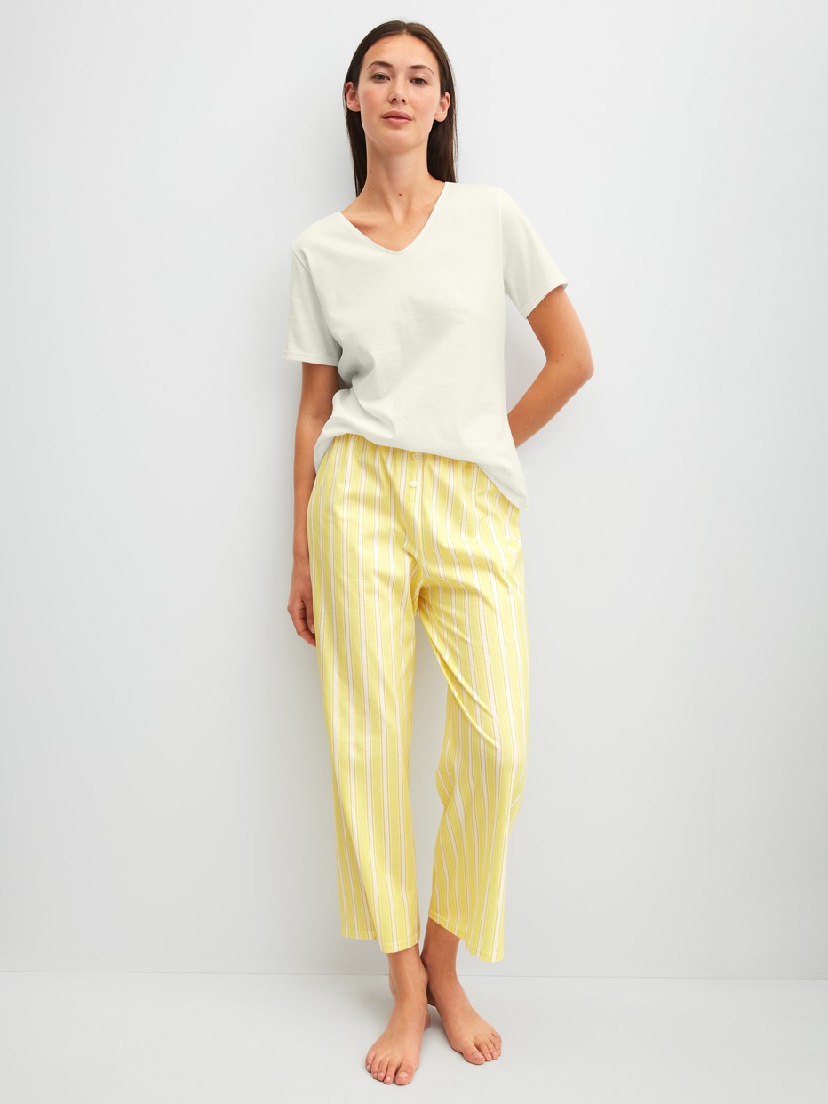 Women model is wearing Shirt shortsleeve made of 100% Cotton in White, Unicoloured from the Favourites Ocean series by CALIDA, Outfit