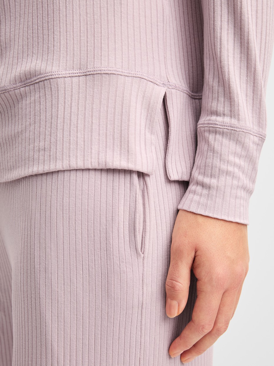 Women model is wearing Shirt long sleeve made of Modal in Purple, Unicoloured from the Feminine Lounge series by CALIDA, Detail