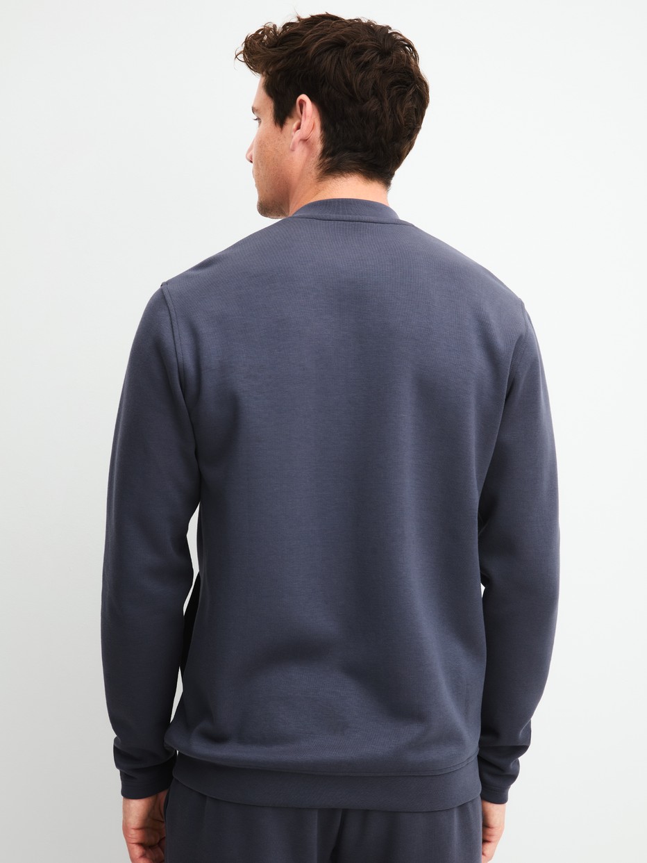 Men model is wearing Jacket made of Cotton in Grey, Unicoloured from the RMX Lounge Casual series by CALIDA, Back view