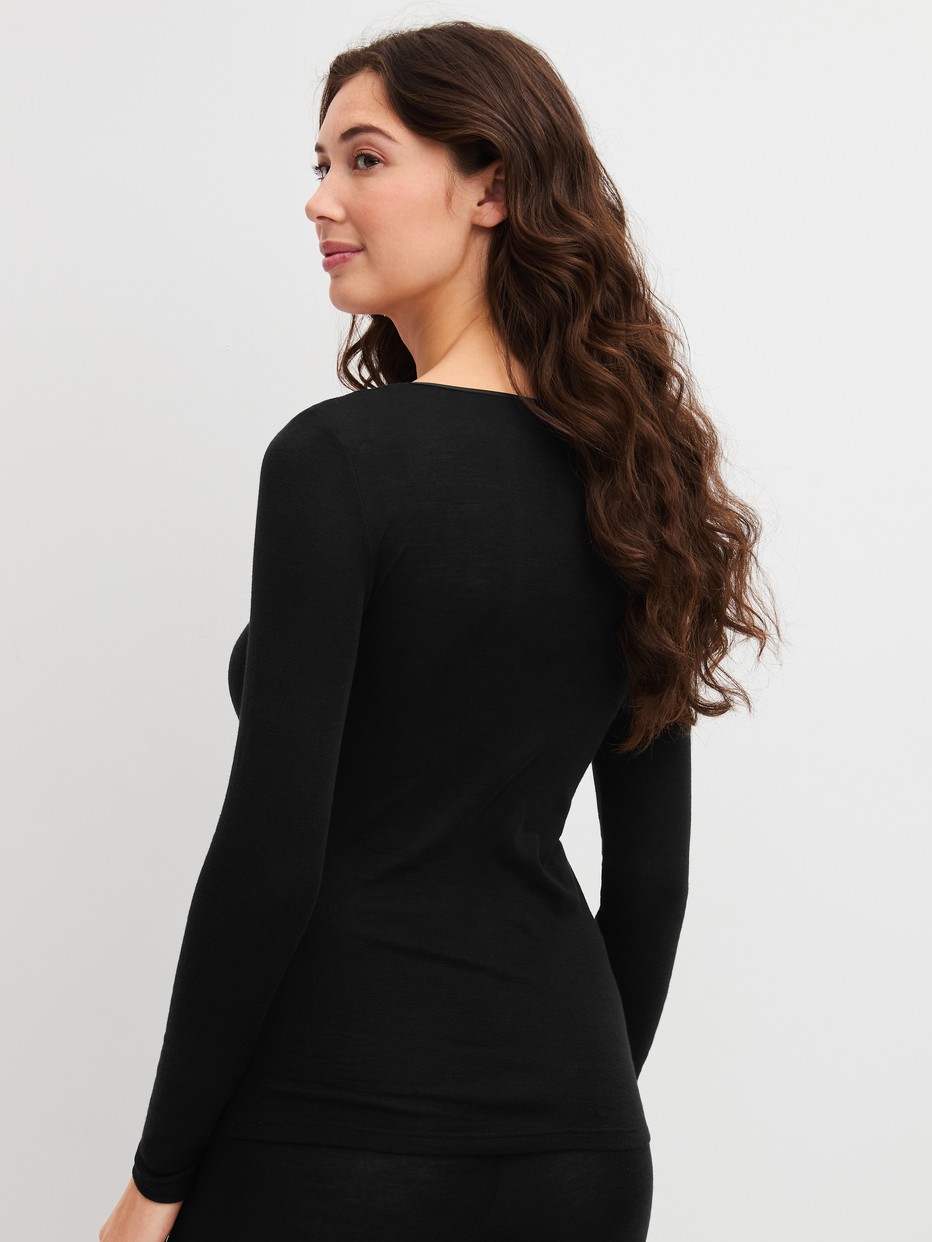 Women model is wearing  made of Wool in Black, Unicoloured from the True Confidence series by CALIDA, Back view