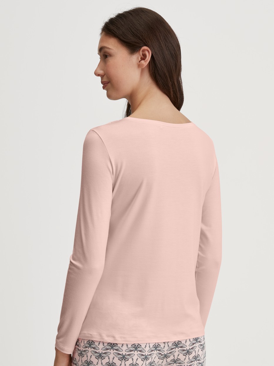 Women model is wearing Shirt long sleeve made of Modal in Pink, Unicoloured from the Favourites Seduction series by CALIDA, Back view