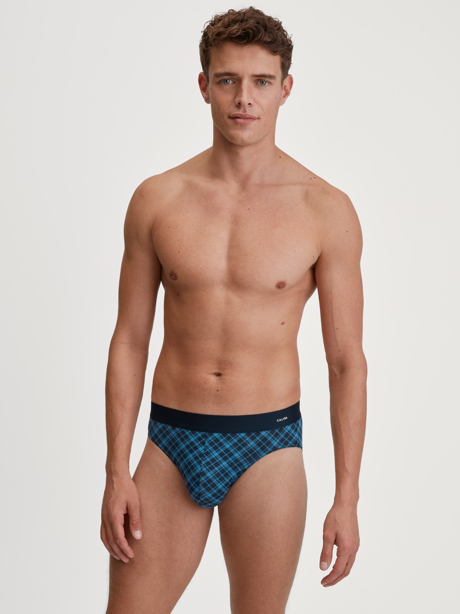 Men model is wearing Brief made of Cotton in Blue, Checked from the Cotton Code Design series by CALIDA, Outfit