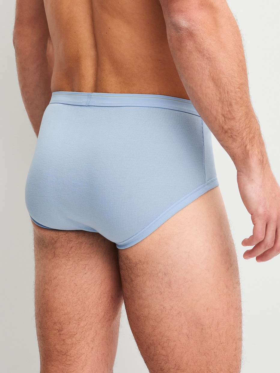 Men model is wearing Classic brief with fly made of 100% Cotton in Blue, Unicoloured from the Twisted Cotton series by CALIDA, Back view