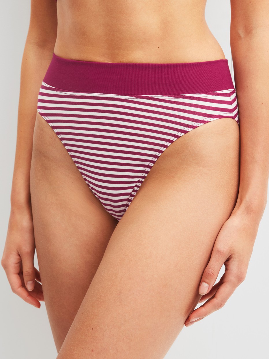 Women model is wearing Brief made of Cotton in Pink, Striped from the Elastic Special series by CALIDA, Front view