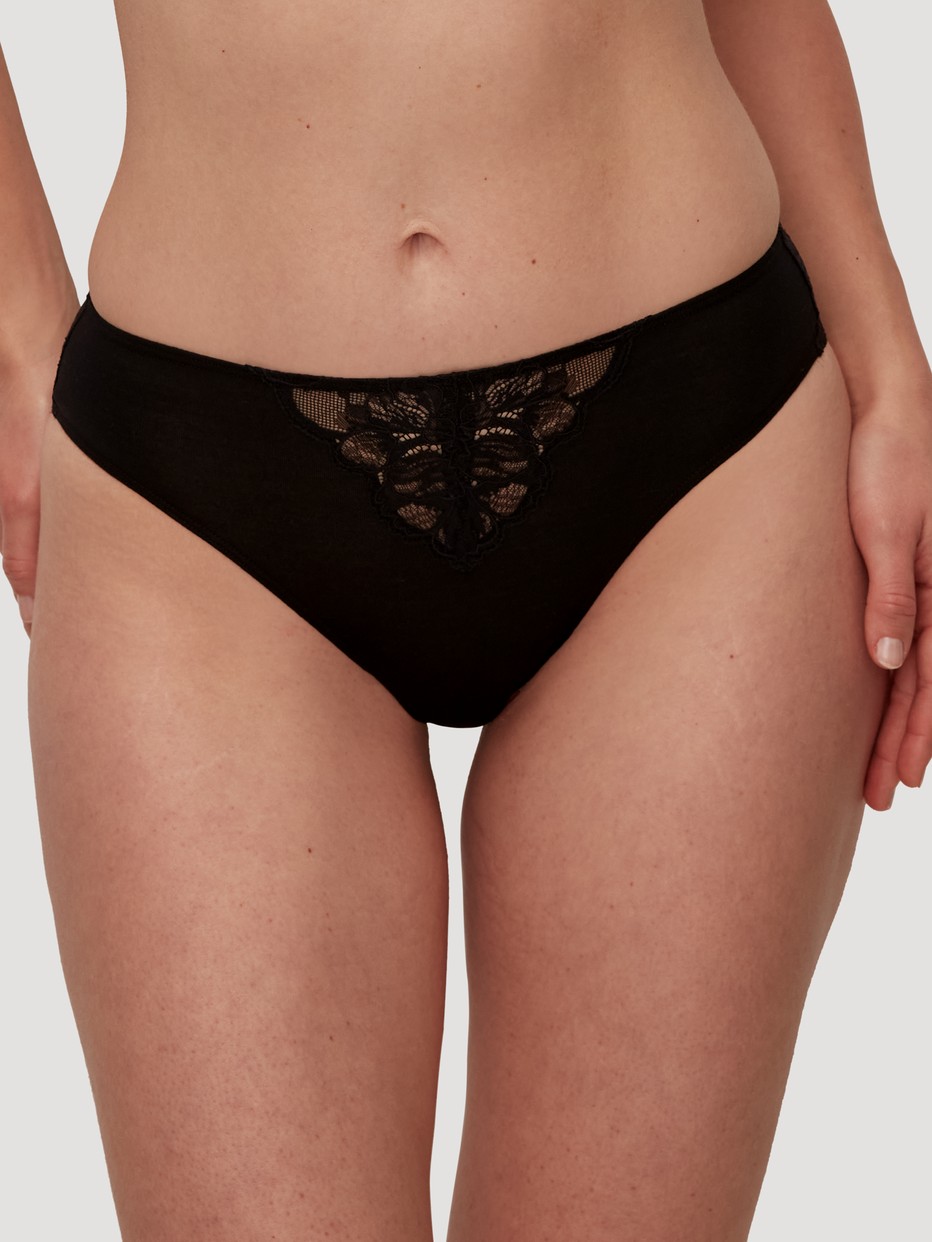 Women model is wearing Brief, regular cut made of Modal in Black, Lace from the Seduction Lace series by CALIDA, Front view