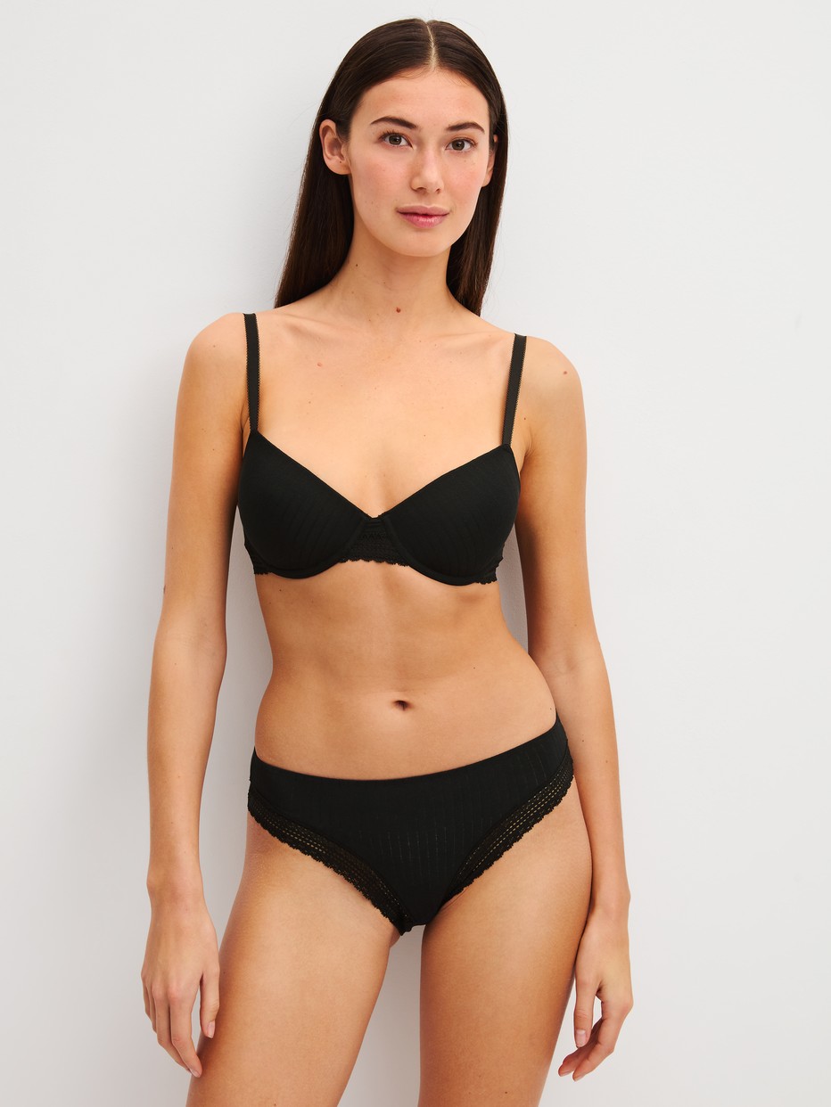 Women model is wearing Brief made of Modal in Black, Unicoloured from the Etude Ajours series by CALIDA, Outfit