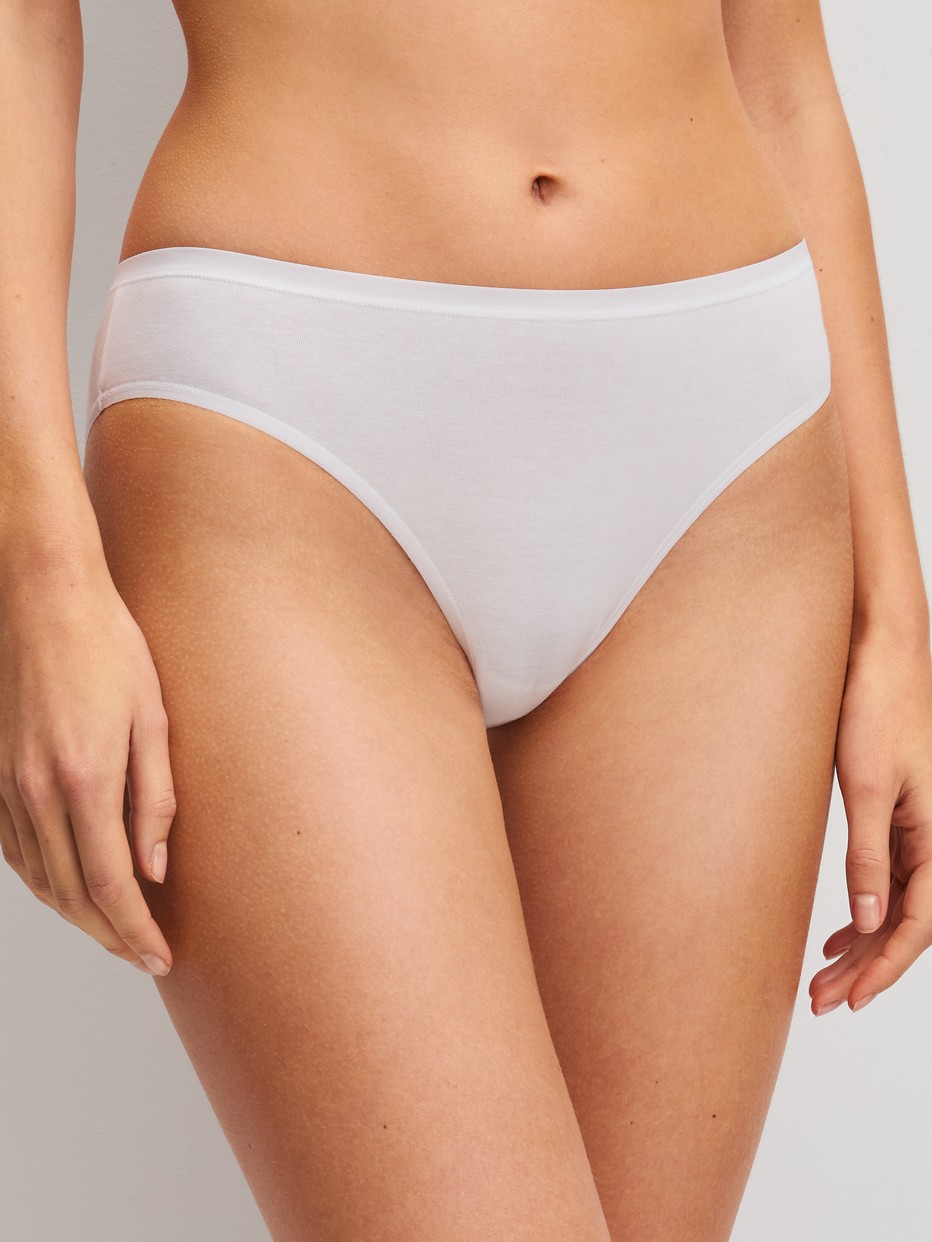 Women model is wearing Briefs, 2-Pack made of Cotton in Green, Unicoloured from the Benefit Women Spec. series by CALIDA, Additional Image