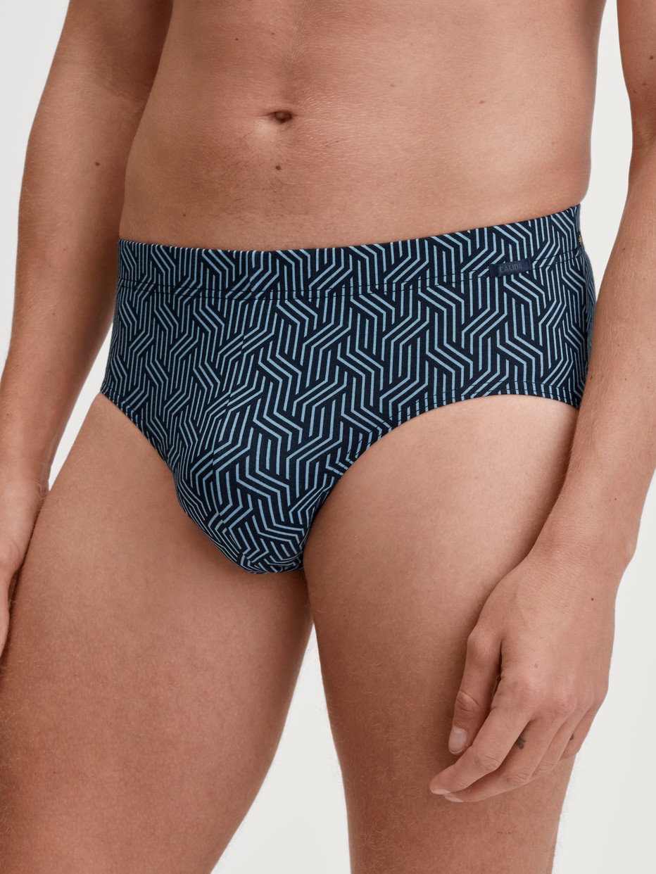 Men model is wearing Brief made of TENCEL™ in Blue, Patterned from the Focus Trend series by CALIDA, Front view