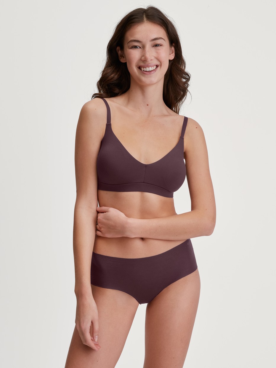 Women model is wearing Panty made of Modal in Red, Unicoloured from the Natural Skin series by CALIDA, Outfit