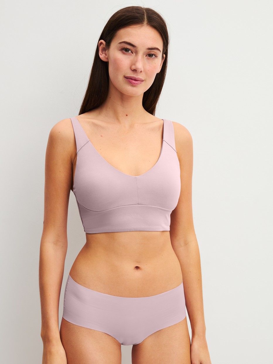 Women model is wearing Panty made of Modal in Purple, Unicoloured from the Natural Skin series by CALIDA, Outfit