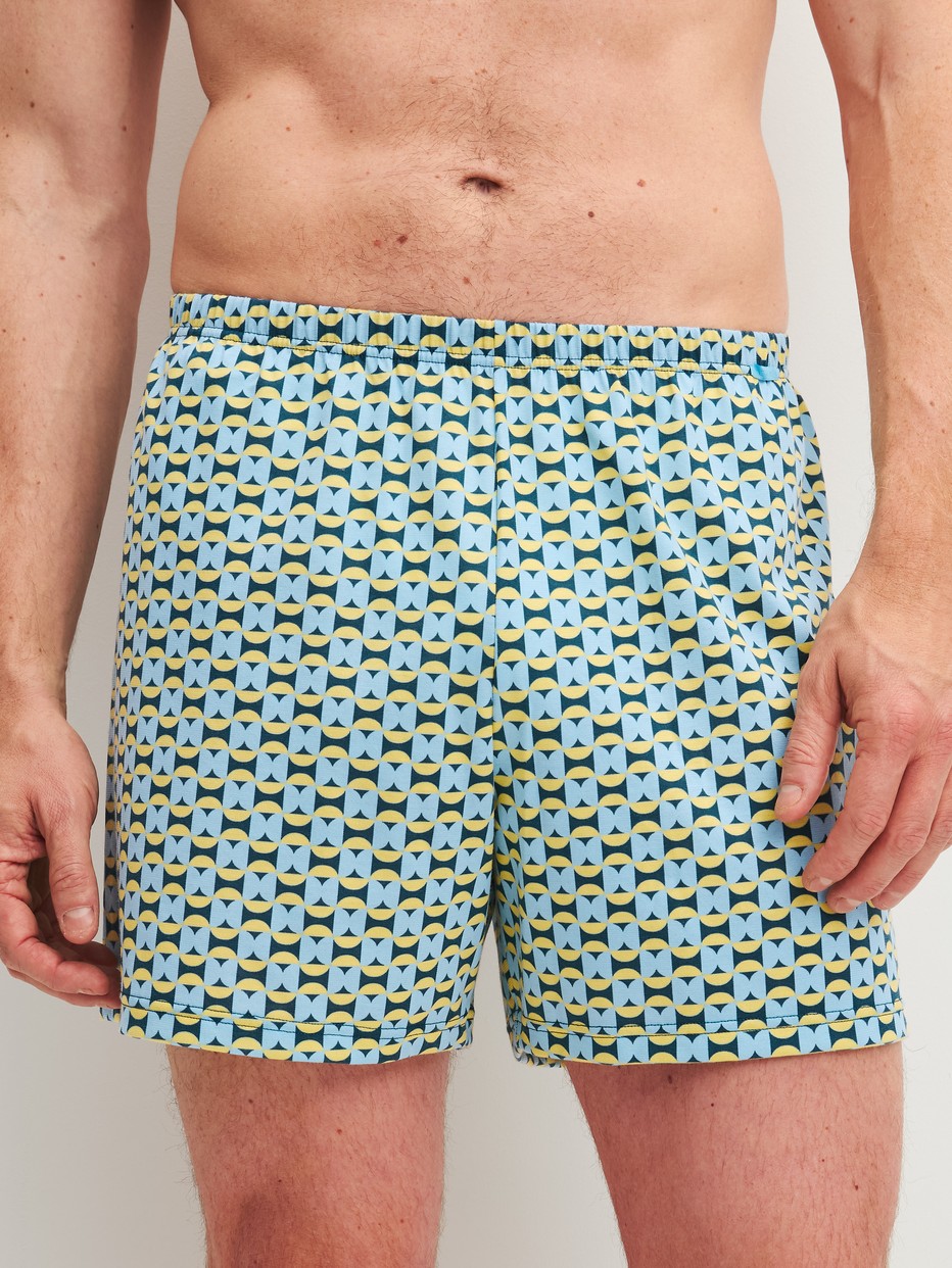 Men model is wearing Boxer Shorts, 2-Pack made of 100% Cotton in Green, Patterned from the Cotton Special series by CALIDA, Back view