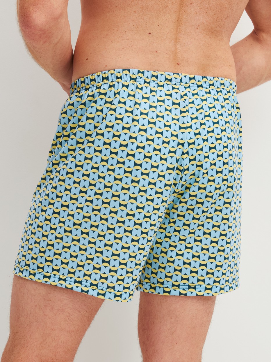 Men model is wearing Boxer Shorts, 2-Pack made of 100% Cotton in Green, Patterned from the Cotton Special series by CALIDA, Back view