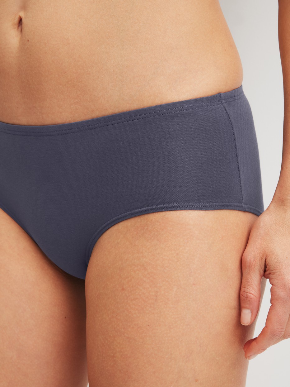 Women model is wearing Low Cut Panty made of Cotton in Grey, Unicoloured from the Essential Cotton series by CALIDA, Detail