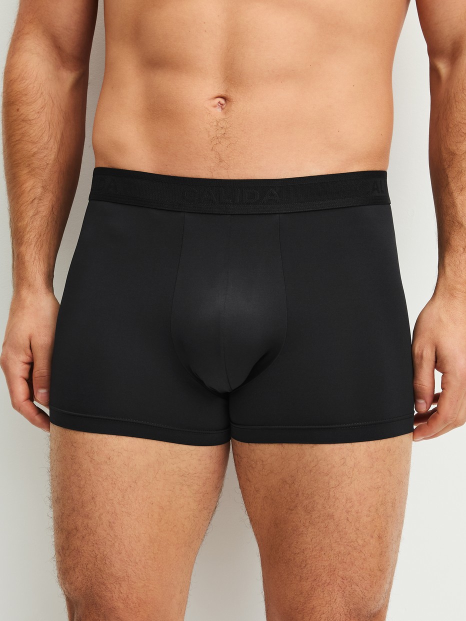 Men model is wearing Boxer brief made of Polyamide in Black, Unicoloured from the Micro Stretch series by CALIDA, Front view