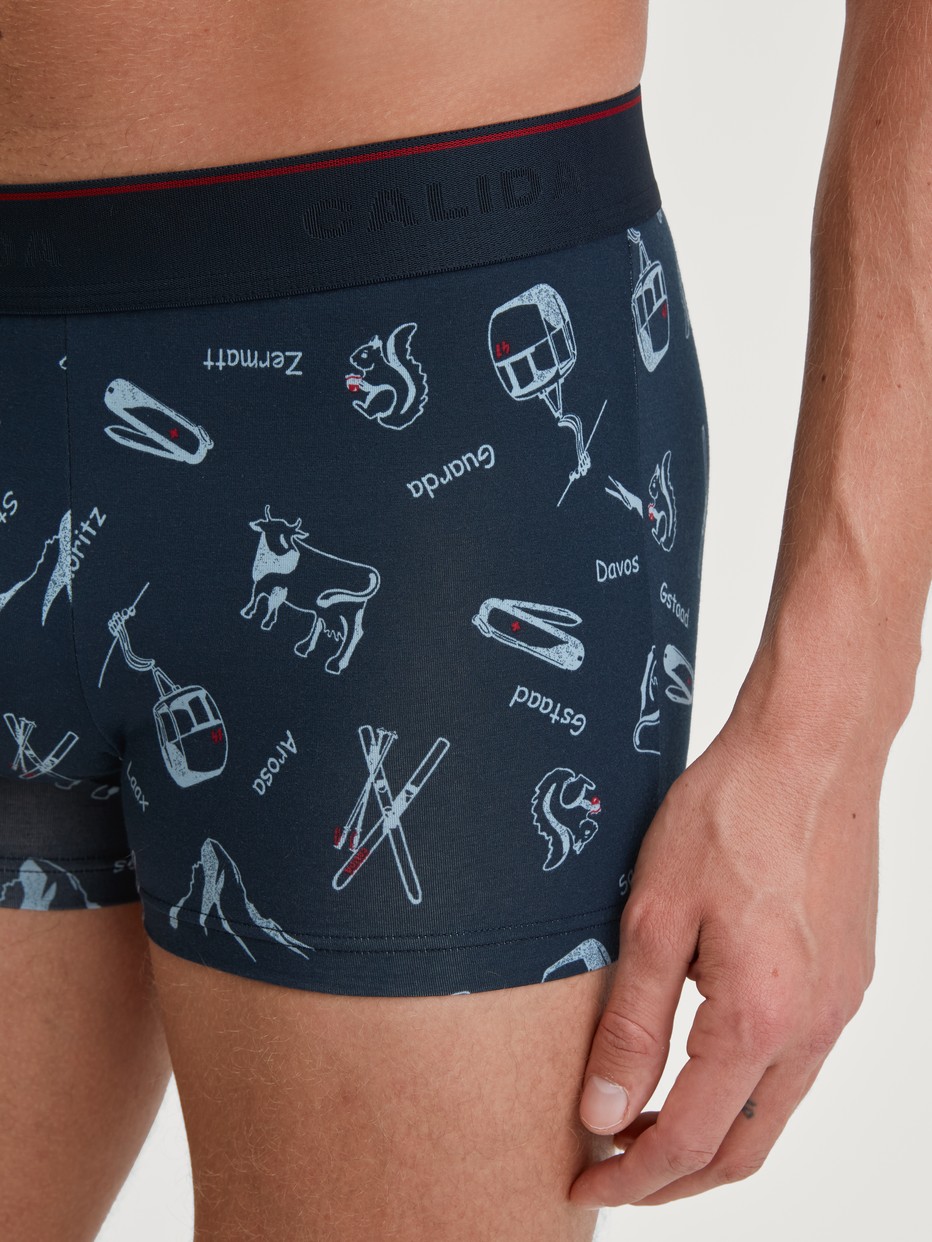 Men model is wearing Boxer brief made of Cotton in Blue, Motif from the Swiss Resort series by CALIDA, Detail
