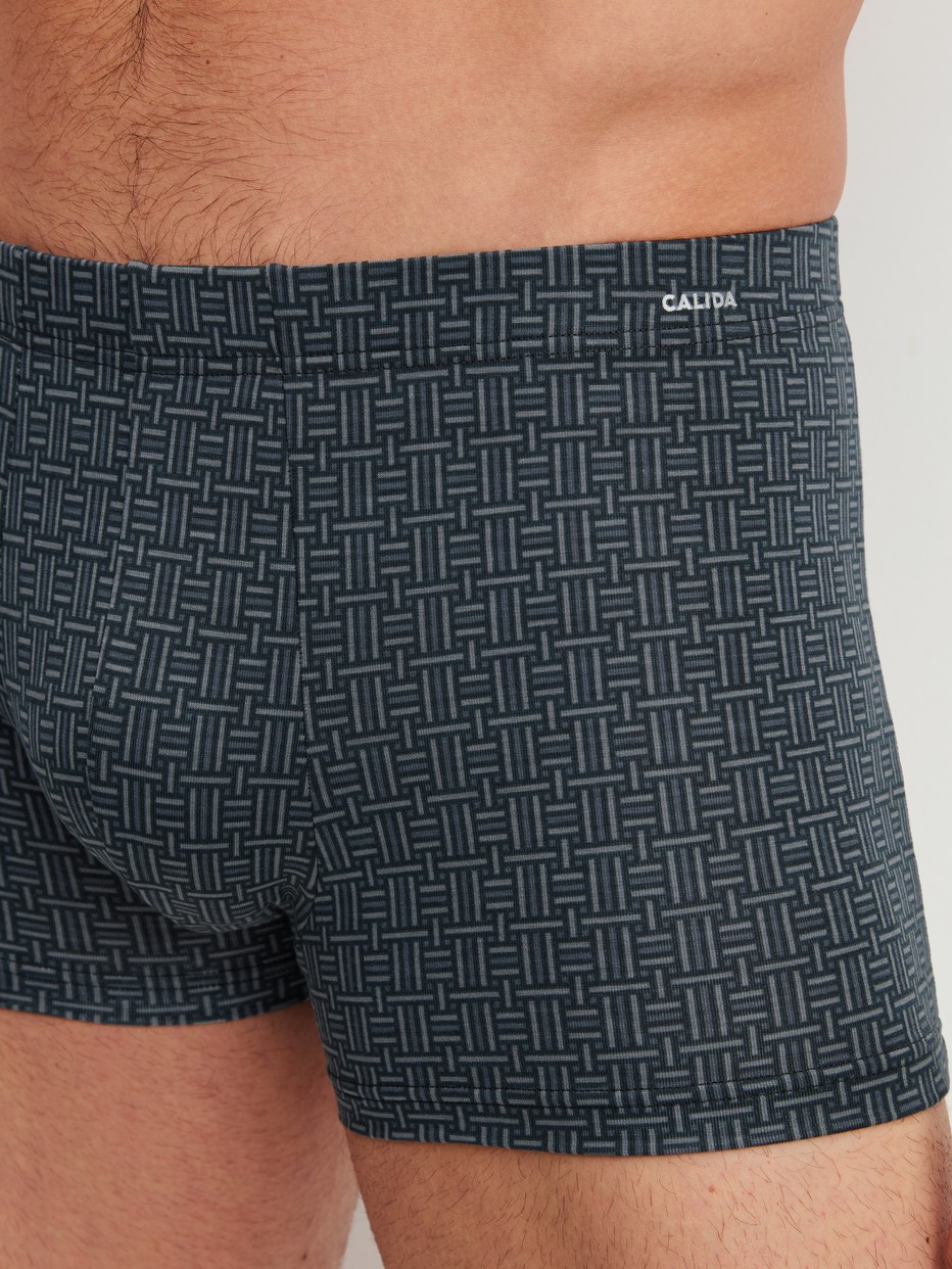 Men model is wearing Boxer brief made of Cotton in Black, Patterned from the Cotton Code Design series by CALIDA, Detail