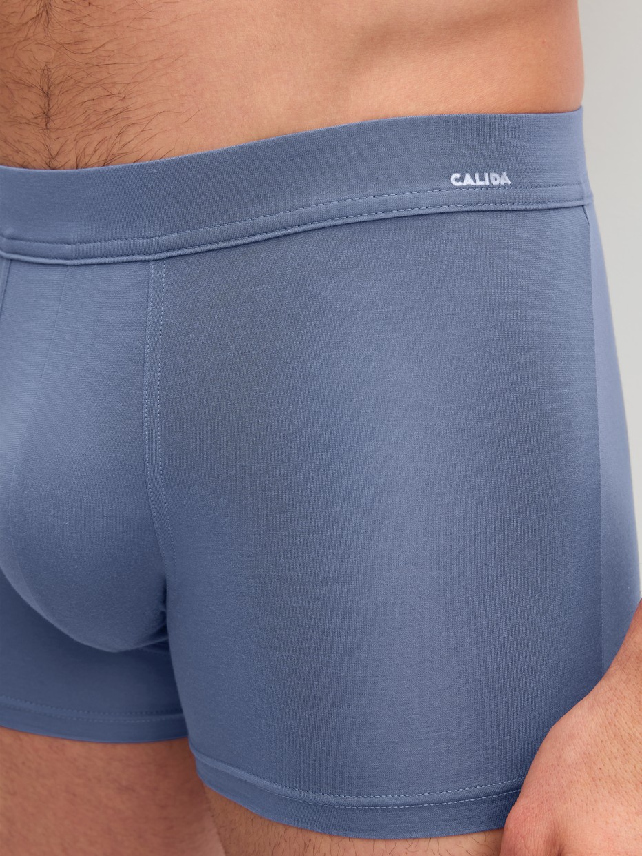 Men model is wearing Boxer brief with Quick Dry Effect made of Modal in Blue, Unicoloured from the Balanced Day series by CALIDA, Detail