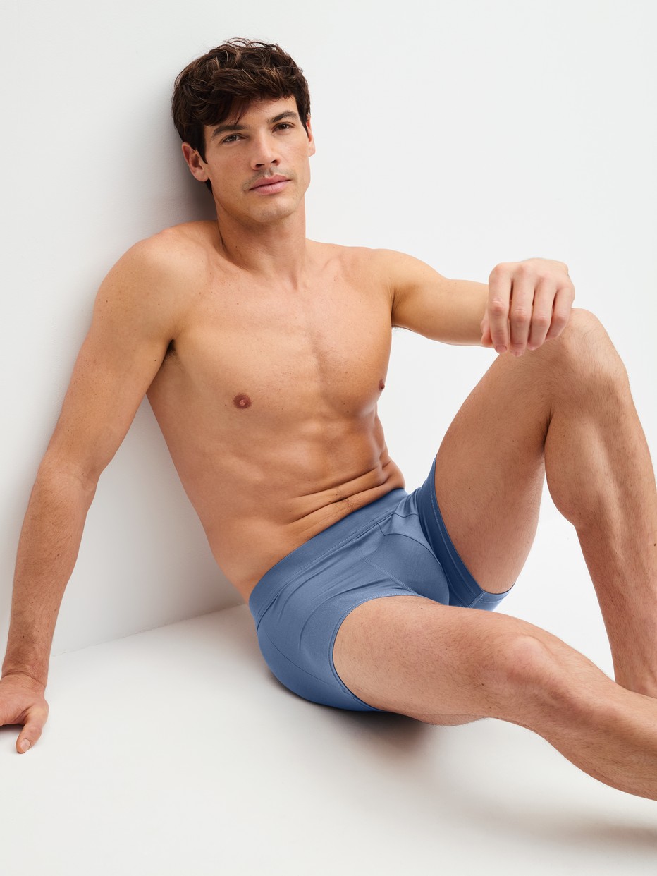 Men model is wearing Boxer brief with Quick Dry Effect made of Modal in Blue, Unicoloured from the Balanced Day series by CALIDA, Additional Image