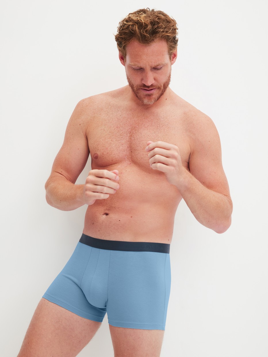Men model is wearing Boxer brief, 3-pack made of Cotton in Blue,  from the Cotton Special series by CALIDA, Outfit
