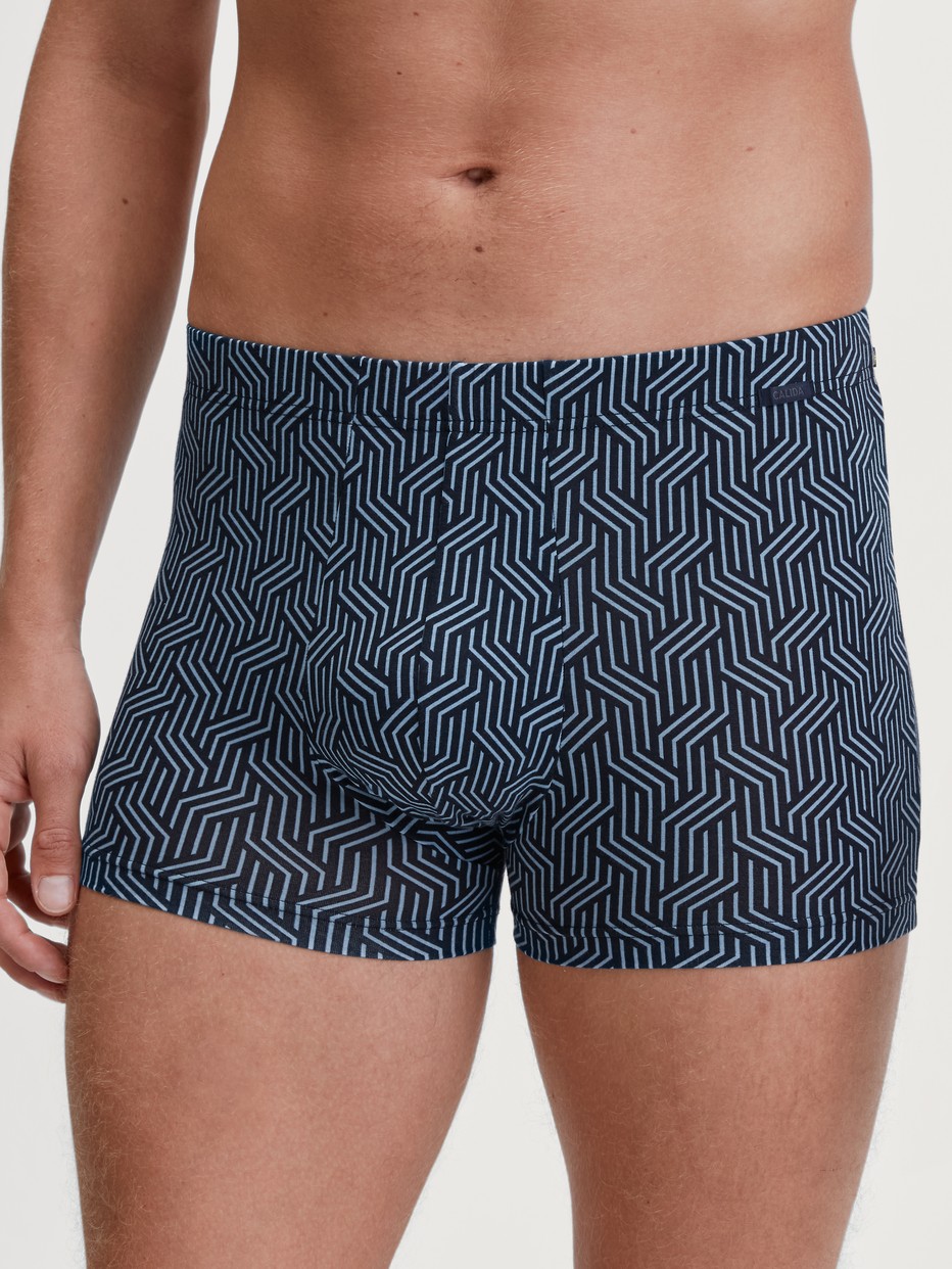Men model is wearing Boxer brief made of TENCEL™ in Blue, Patterned from the Focus Trend series by CALIDA, Front view