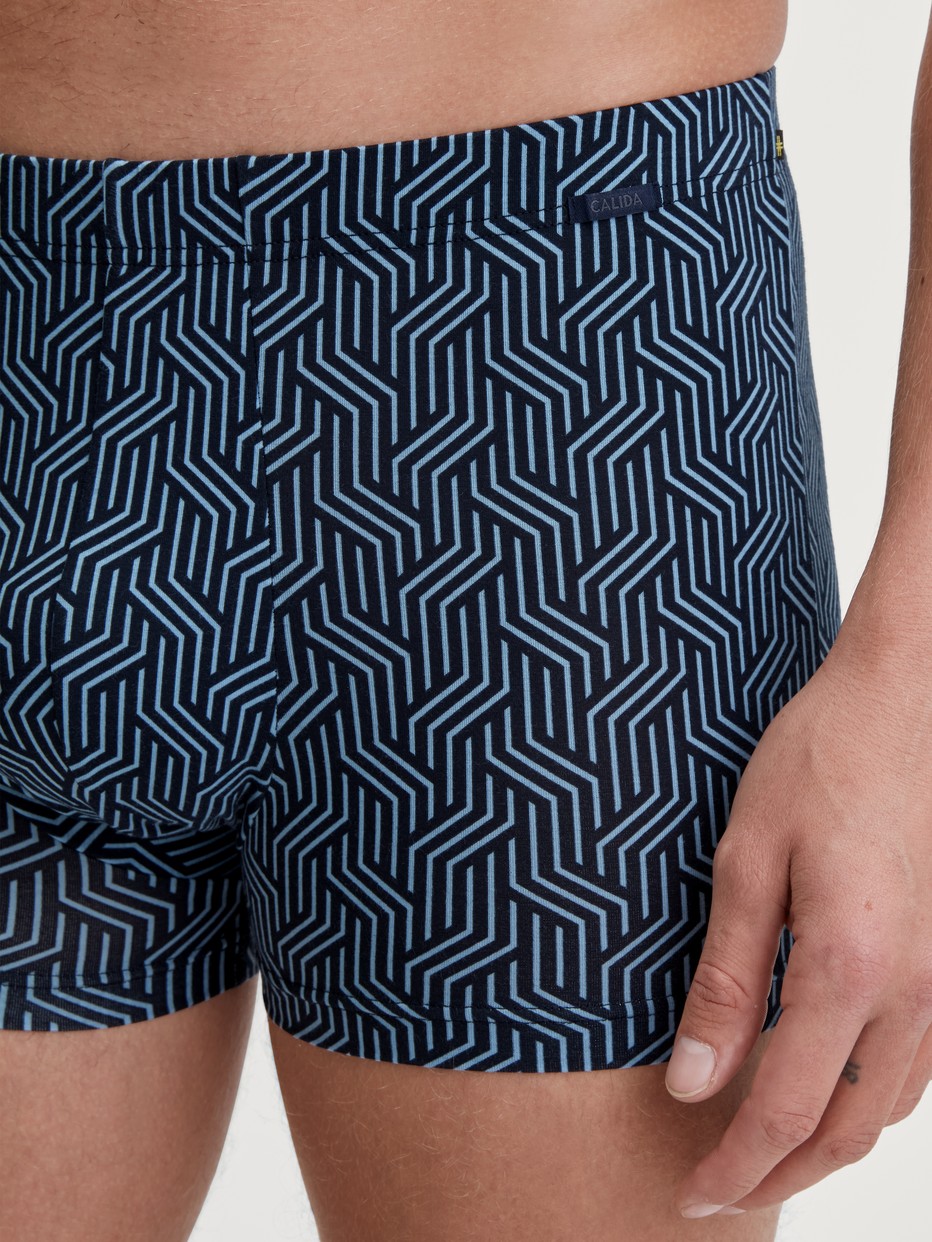 Men model is wearing Boxer brief made of TENCEL™ in Blue, Patterned from the Focus Trend series by CALIDA, Detail