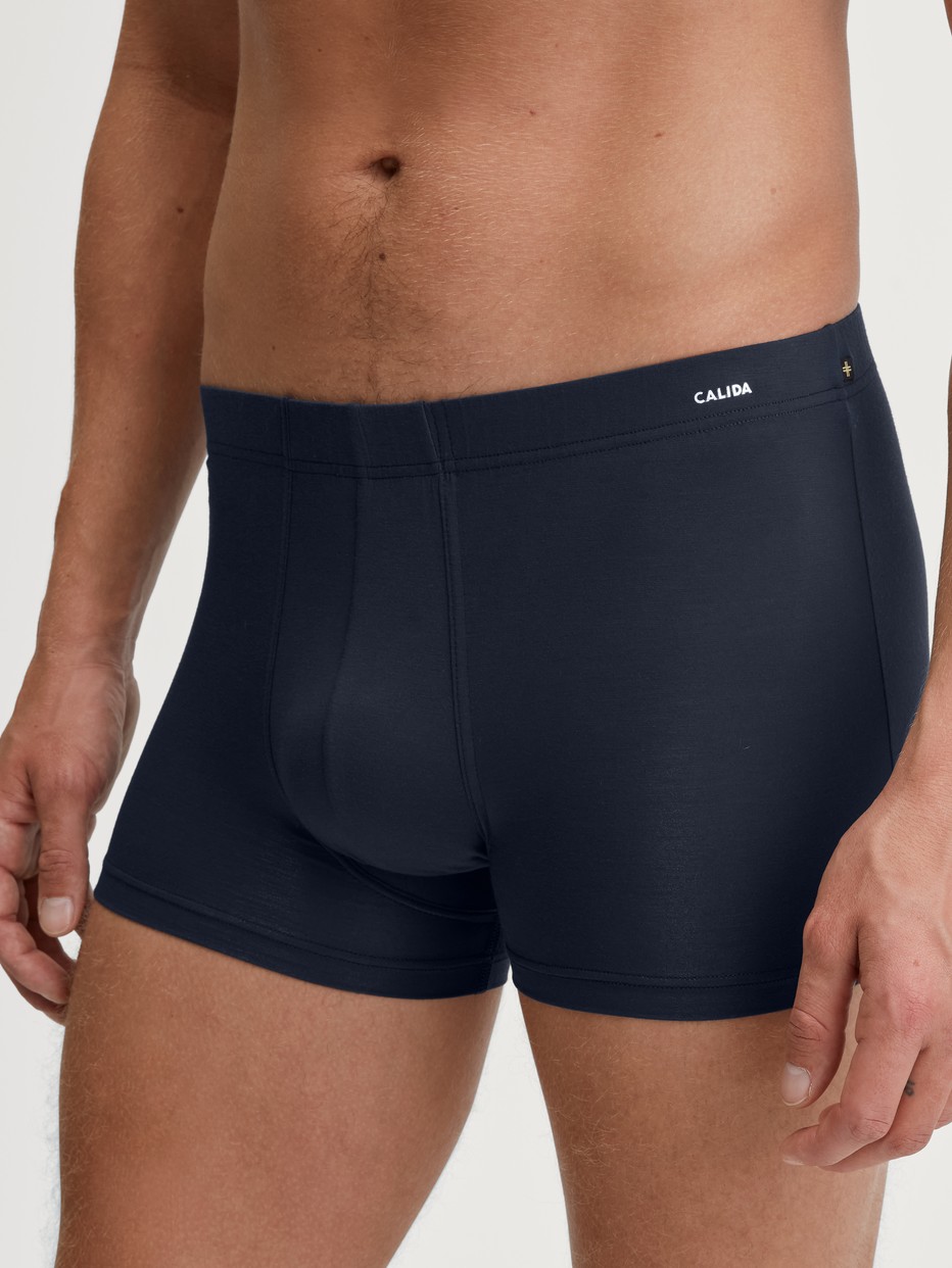 Men model is wearing Boxerbrief made of TENCEL™ in Blue, Unicoloured from the Balanced Day series by CALIDA, Front view