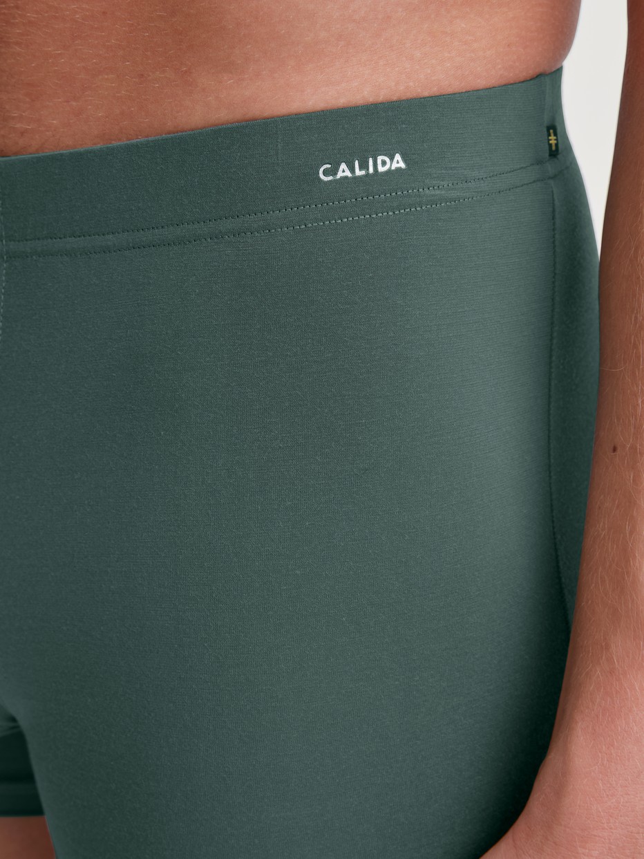 Men model is wearing Boxerbrief made of Modal in Green, Unicoloured from the Balanced Day series by CALIDA, Detail