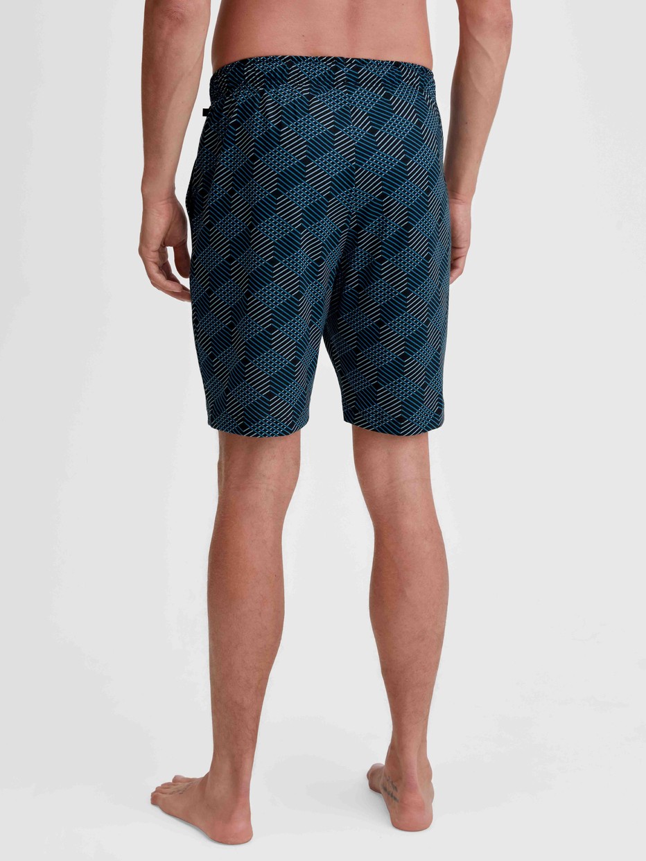 Le mannequin Homme porte le/la Bermduda en 100% coton de couleur Noir, À motifs, de la série RMX Sleep Leisure de CALIDA, Vue arrière