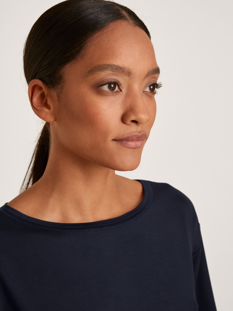 Women model is wearing Nightdress made of Modal in Blue, Unicoloured from the DSW Balancing series by CALIDA, Detail