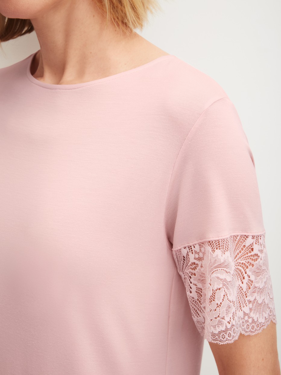 Women model is wearing Short-sleeved nightdress, length 95 cm made of Modal in Pink, Lace from the Elegant Dreams series by CALIDA, Detail