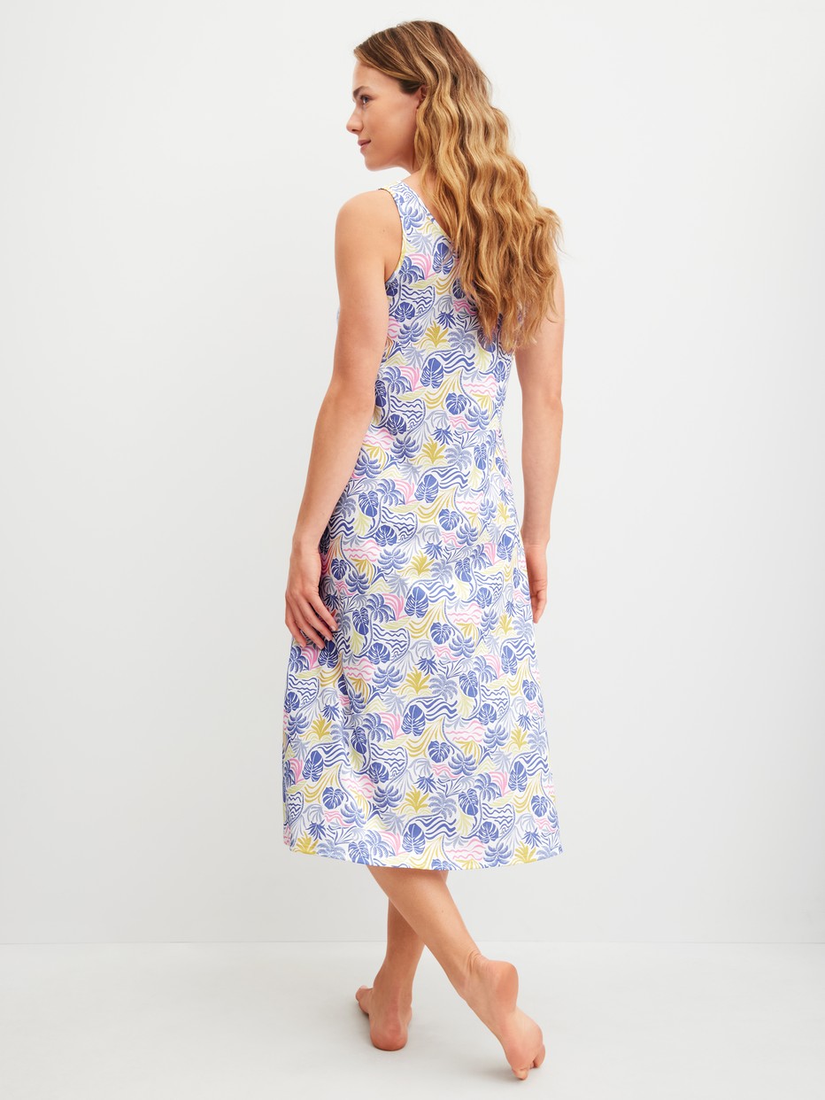 Women model is wearing Nightdress, length 125 cm made of 100% Cotton in Blue, Floral from the Coastal Dreams series by CALIDA, Back view
