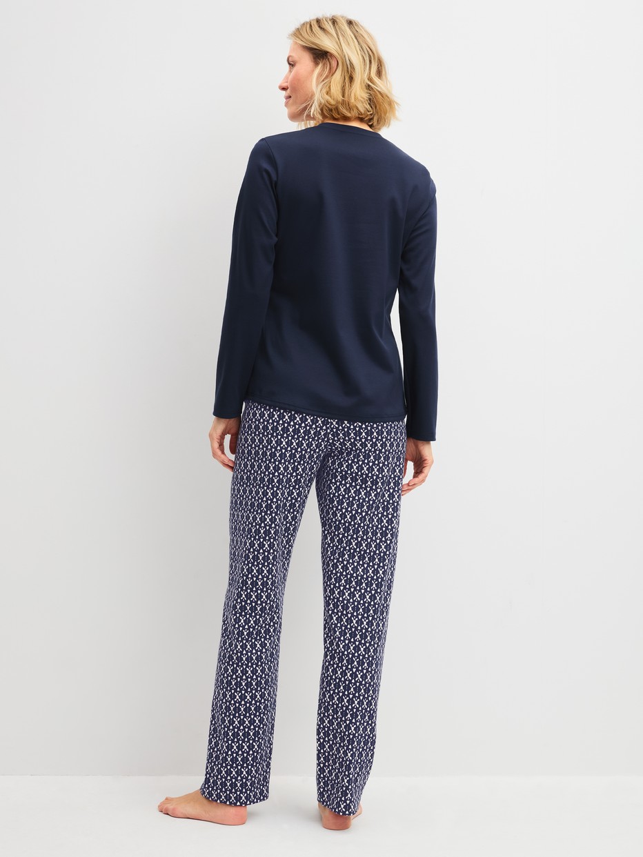Women model is wearing  made of 100% Cotton in Blue, Patterned from the Midnight Hearts series by CALIDA, Back view