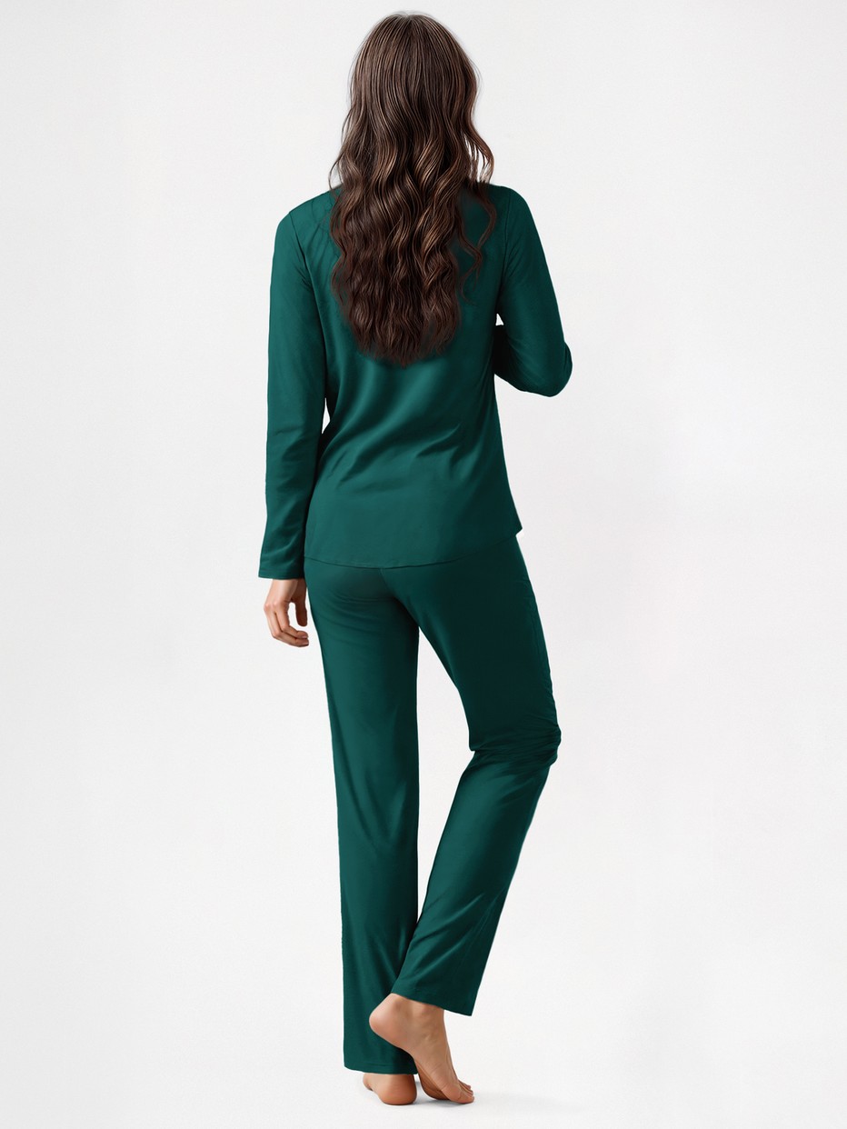 Women model is wearing Pyjamas with buttons made of Lyocell in Green, Unicoloured from the Nightwear Xtra series by CALIDA, Back view