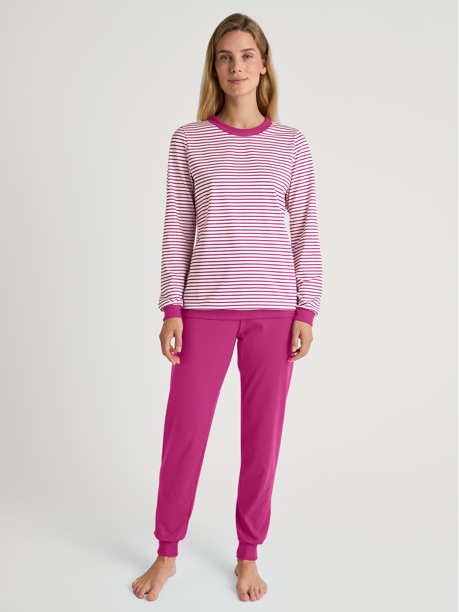 Women model is wearing Pyjama with cuff made of 100% Cotton in Pink, Patterned from the Cotton Special series by CALIDA, Front view