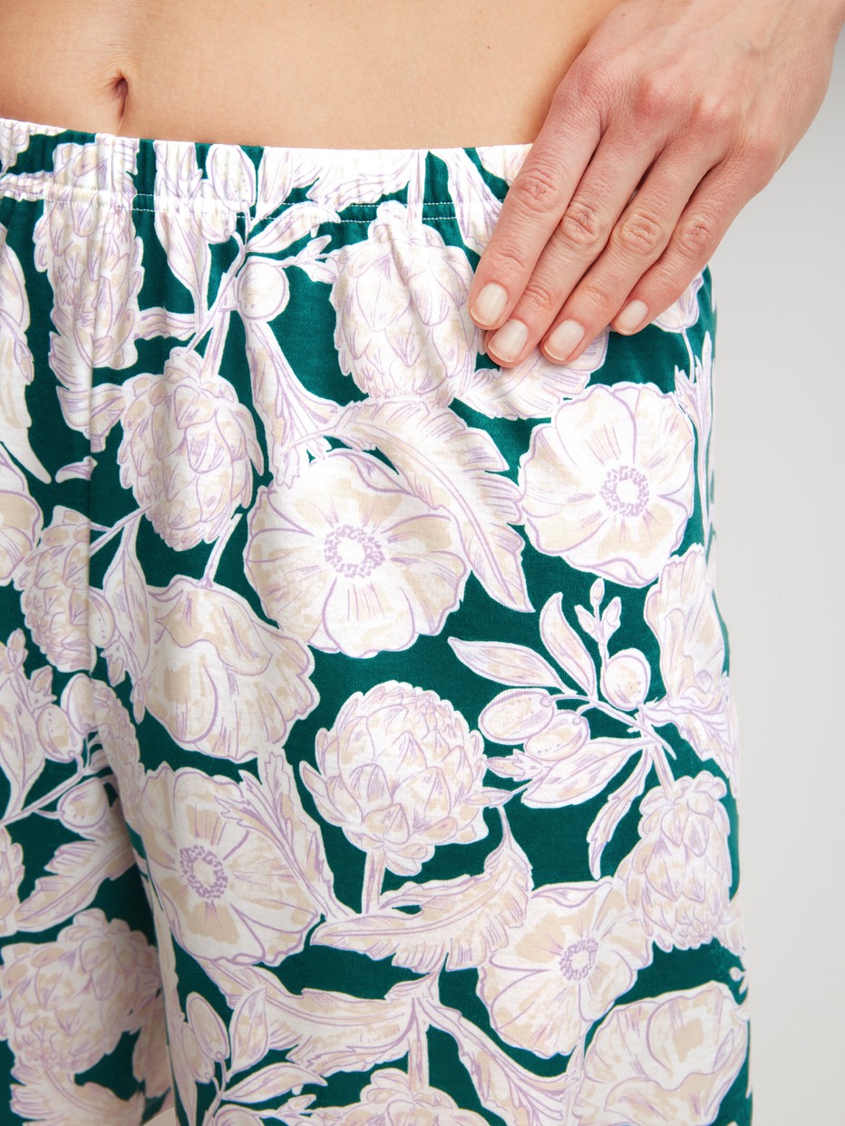 Women model is wearing Short pyjama made of 100% Cotton in Turquoise, Floral from the Botanic Dreams series by CALIDA, Detail