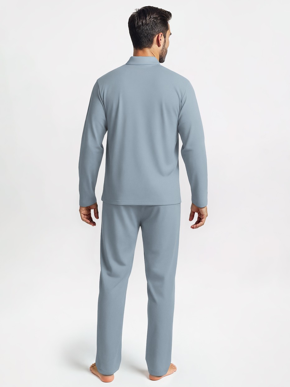 Le mannequin Homme porte le/la Pyjama boutonné en Lyocell de couleur Bleu, Unicolore, de la série Nightwear Xtra de CALIDA, Vue arrière