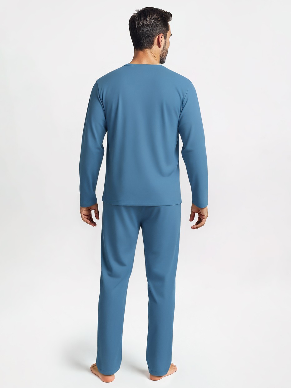 Le mannequin Homme porte le/la Pyjama, longue en 100% coton de couleur Bleu, Unicolore, de la série Nightwear Xtra de CALIDA, Vue arrière