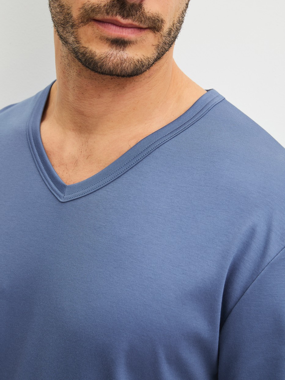 Men model is wearing Pyjamas, long made of 100% Cotton in Blue, Unicoloured from the Relax Choice 1 series by CALIDA, Detail