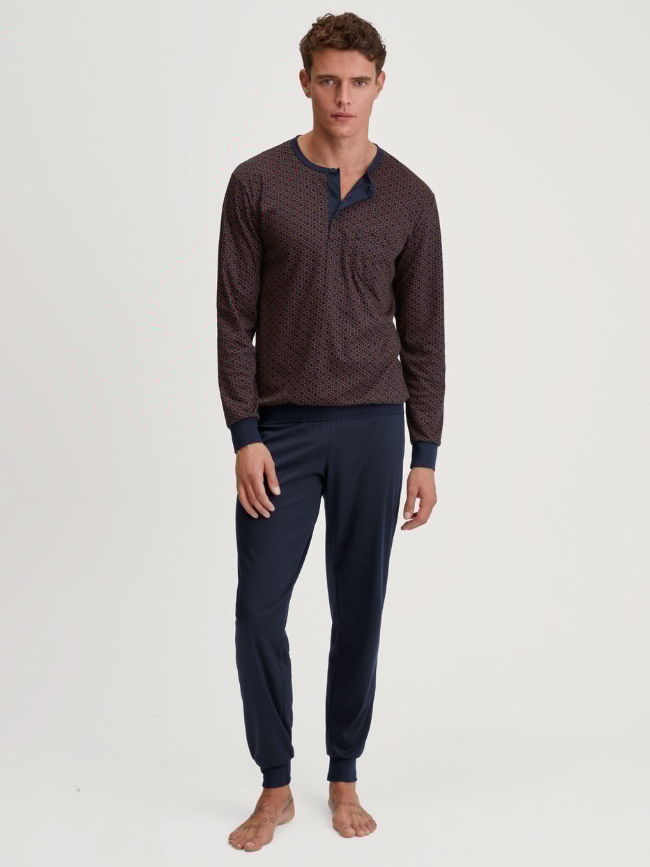 Men model is wearing Pyjama with cuff made of 100% Cotton in Blue, Unicoloured from the Relax Choice 1 series by CALIDA, Front view