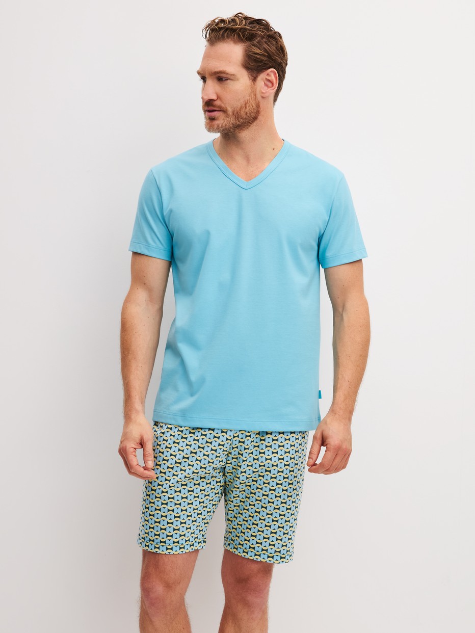 Men model is wearing Short pyjama made of 100% Cotton in Green, Patterned from the Cotton Special series by CALIDA, Front view