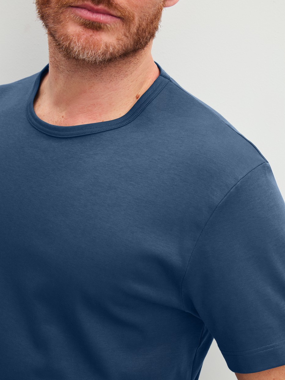 Men model is wearing Short pyjama made of 100% Cotton in Blue, Checked from the Relax Streamline 2 series by CALIDA, Detail