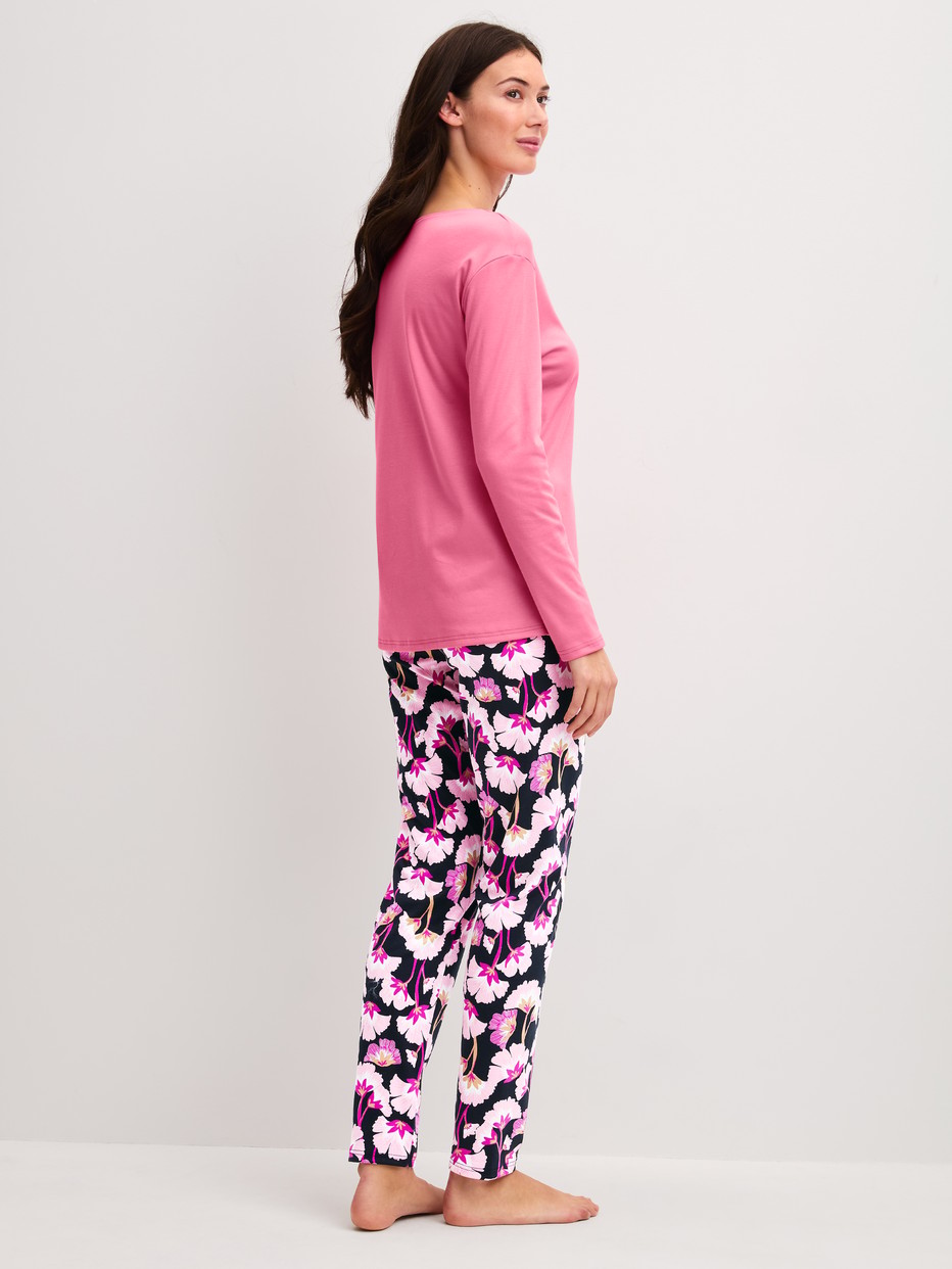 Women model is wearing Pyjamas, long made of 100% Cotton in Pink, Floral from the Autumn Dreams series by CALIDA, Back view