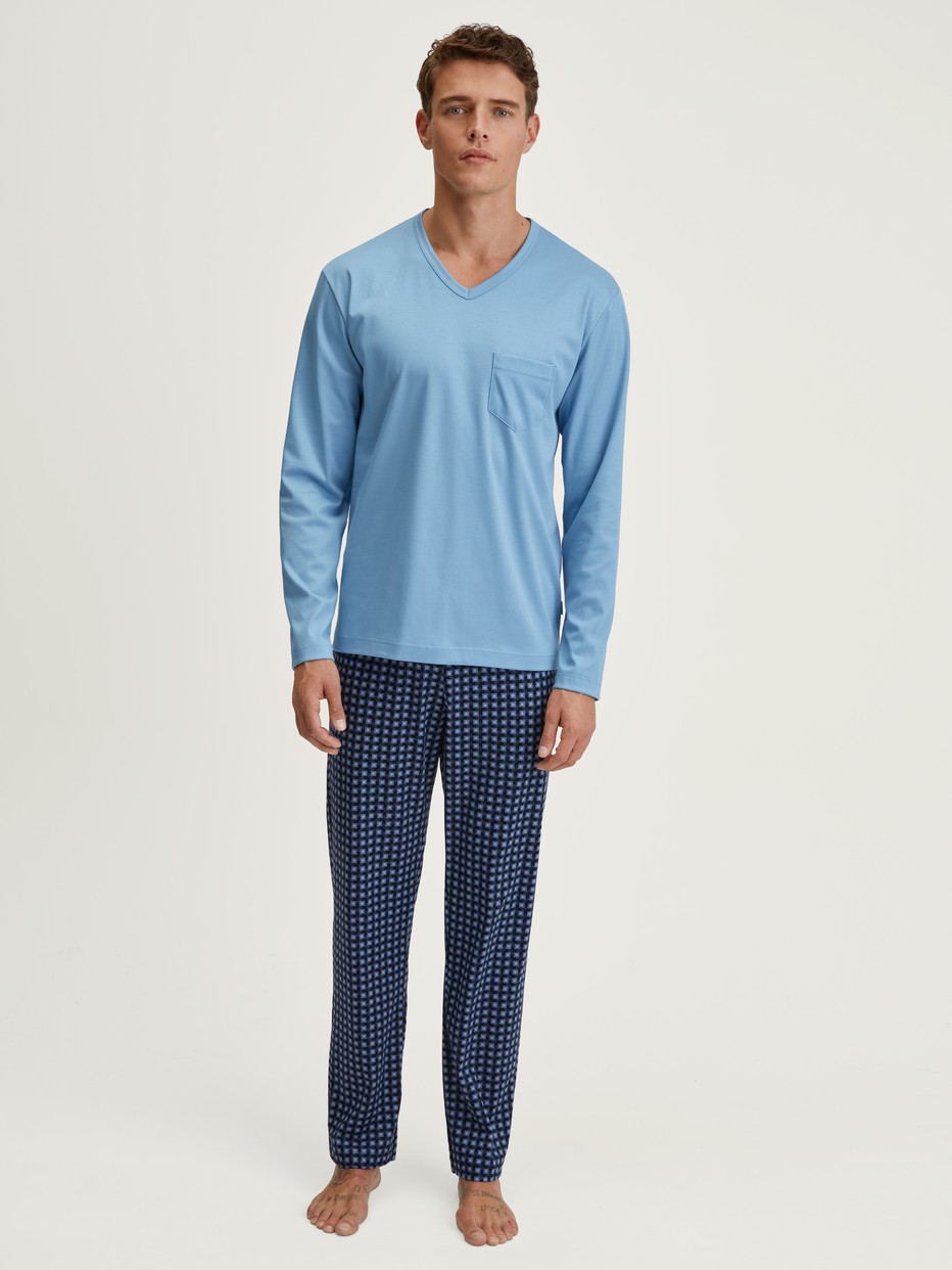Men model is wearing Pyjamas, long made of 100% Cotton in Blue, Checked from the Relax Streamline 1 series by CALIDA, Front view