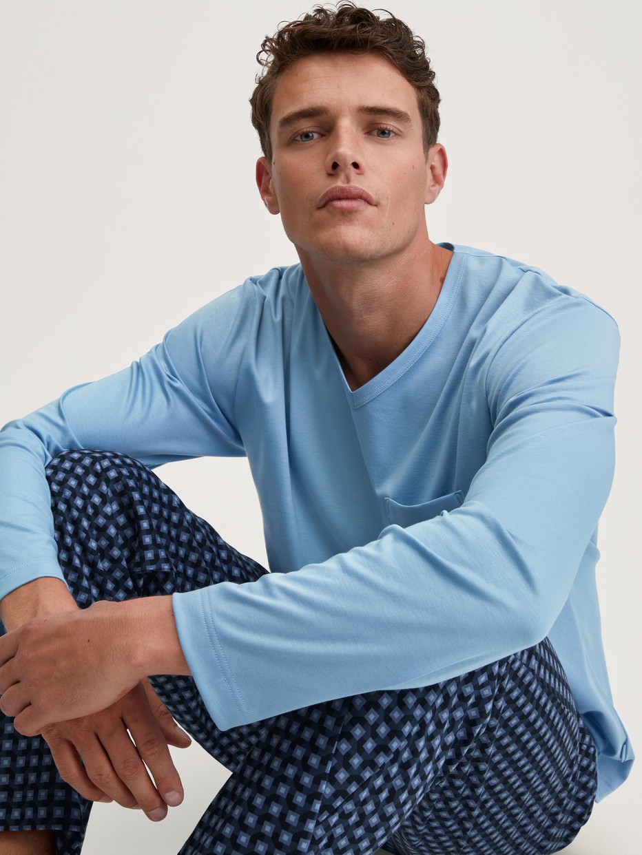 Men model is wearing Pyjamas, long made of 100% Cotton in Blue, Checked from the Relax Streamline 1 series by CALIDA, Front view