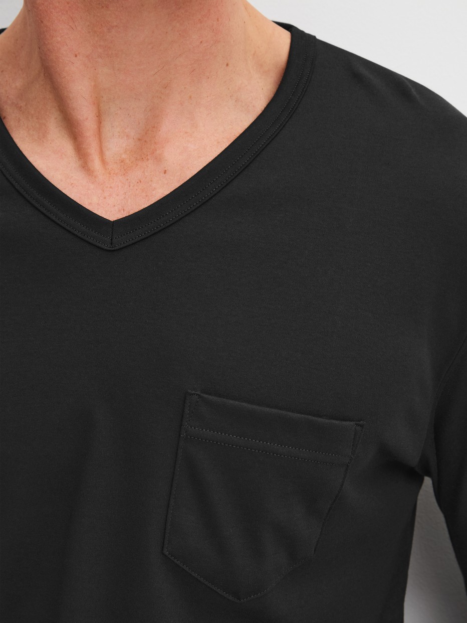 Men model is wearing Pyjamas, long made of 100% Cotton in Black, Patterned from the Relax Streamline 2 series by CALIDA, Detail