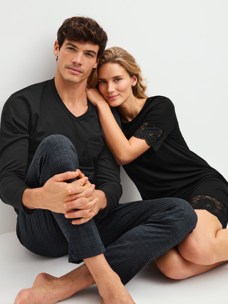 Men model is wearing Pyjamas, long made of 100% Cotton in Black, Patterned from the Relax Streamline 2 series by CALIDA, Additional Image