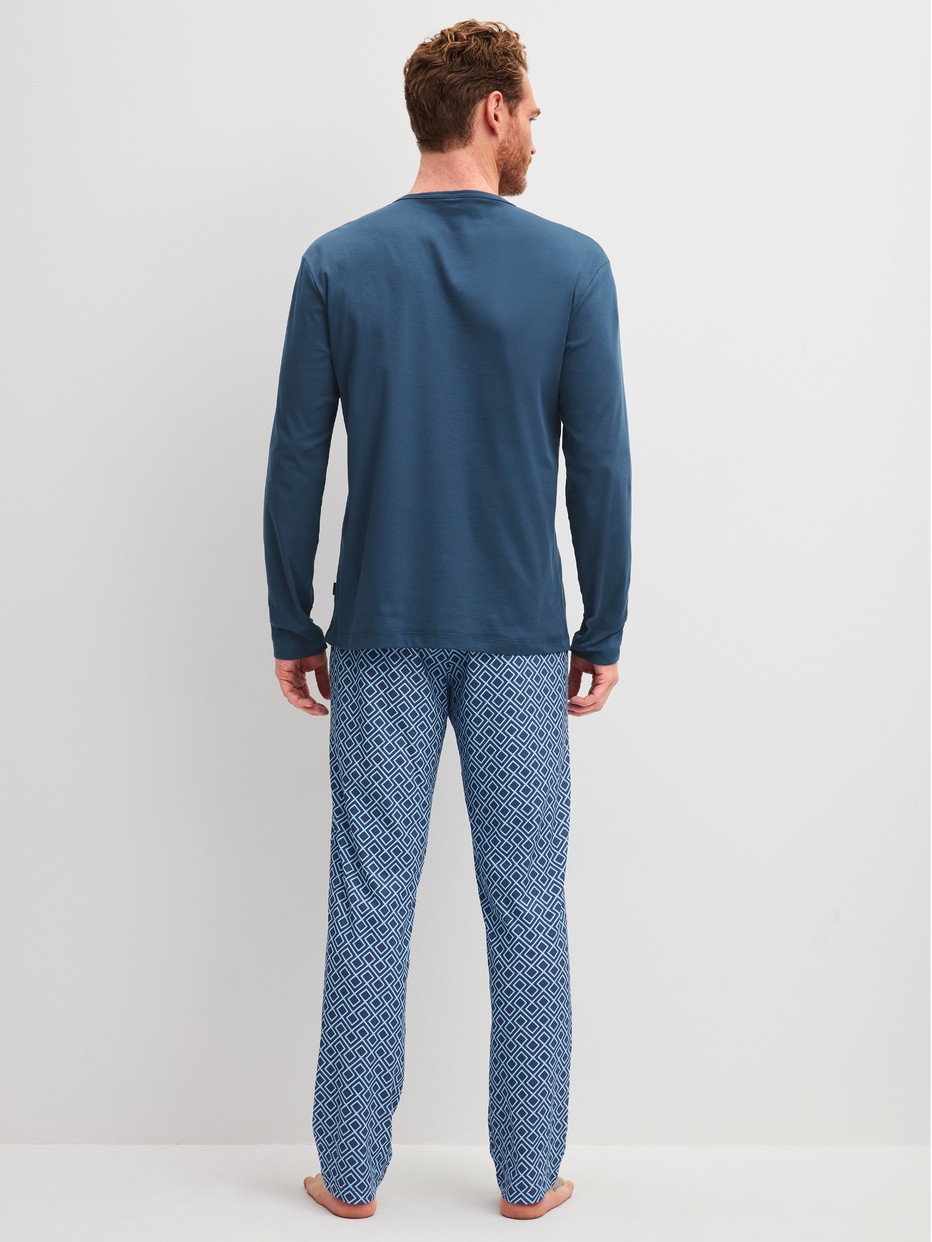 Men model is wearing Pyjamas, long made of 100% Cotton in Blue, Checked from the Relax Streamline 2 series by CALIDA, Back view